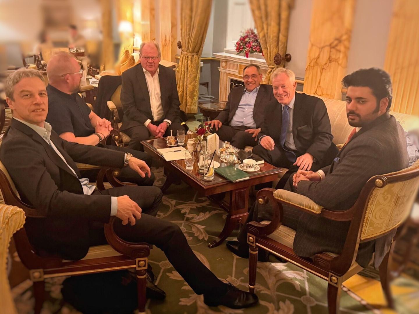 Xyra Group board meeting in a grand lounge